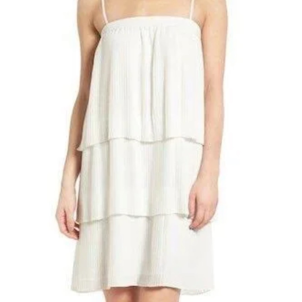 White pleated tiered mini dress